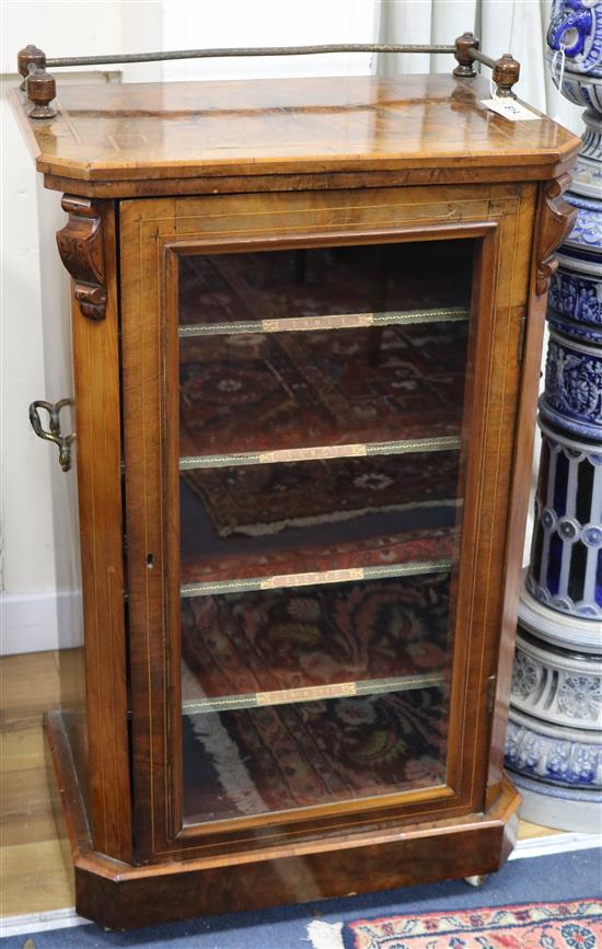 An Edwardian walnut music cabinet W.54cm